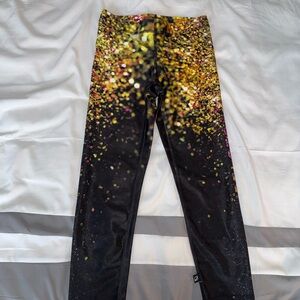 Terez Peloton Black and Gold Sparkle Capri Leggings
